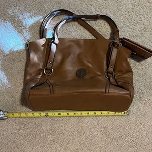 Women’s brown Mulberry purse.